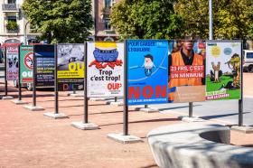 Posters ahead of Swiss votes in a park