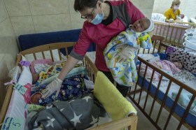 Baby and caretaker