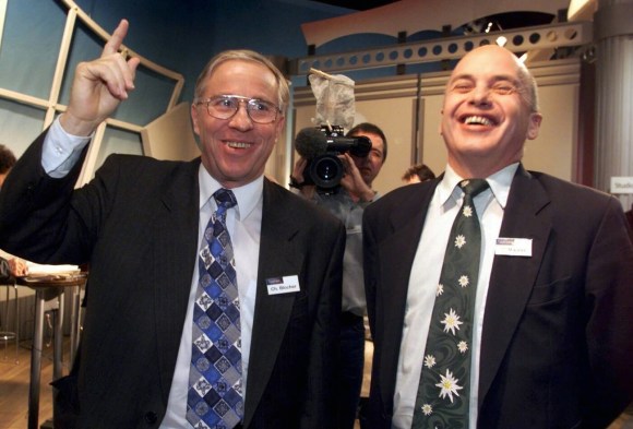 Christoph Blocher and Ueli Maurer share a joke in 1999
