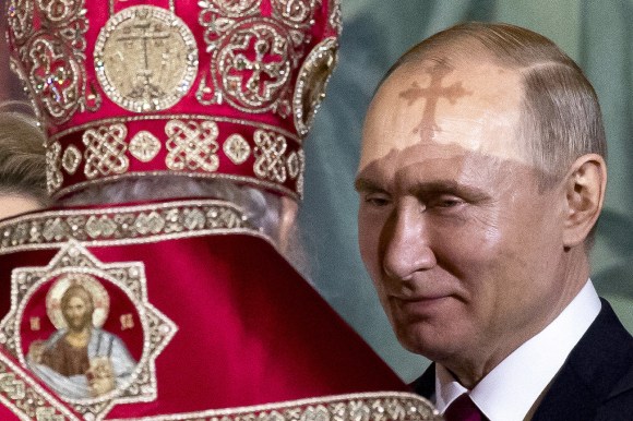 Putin with orthodox cross on forehead