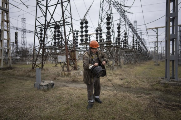 Engineer repairs Ukrainian power plant