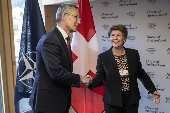 Stoltenberg and Amherd shaking hands