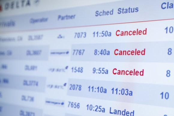 Flight cancelations are displayed on the flight information display system