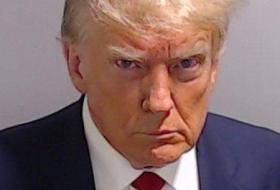 Trump's mug shot released after booking at Georgia jail on ...