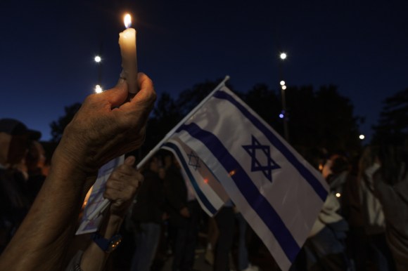 Candle and Israeli flag